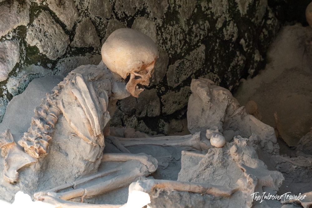 Human skeletal remains in a stone boat chamber at Herculaneum, victims of the 79 AD Vesuvius eruption