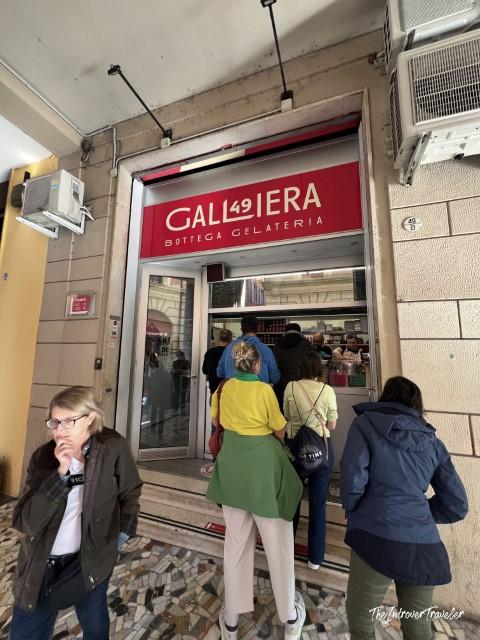 Customers queuing outside Galliera 49 Bottega Gelateria, one of the best gelato shops in Bologna
