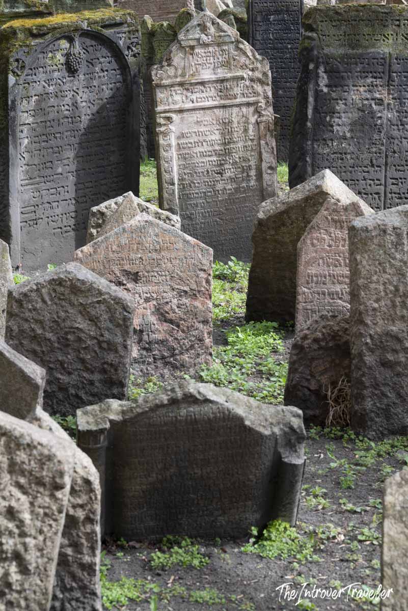 Densely packed Hebrew-inscribed tombstones at the Old Jewish Cemetery in Prague, Josefov quarter