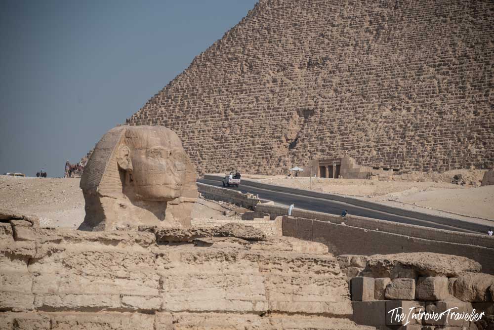 Great Sphinx of Giza in profile, with the Great Pyramid of Khufu rising behind it on the Giza Plateau