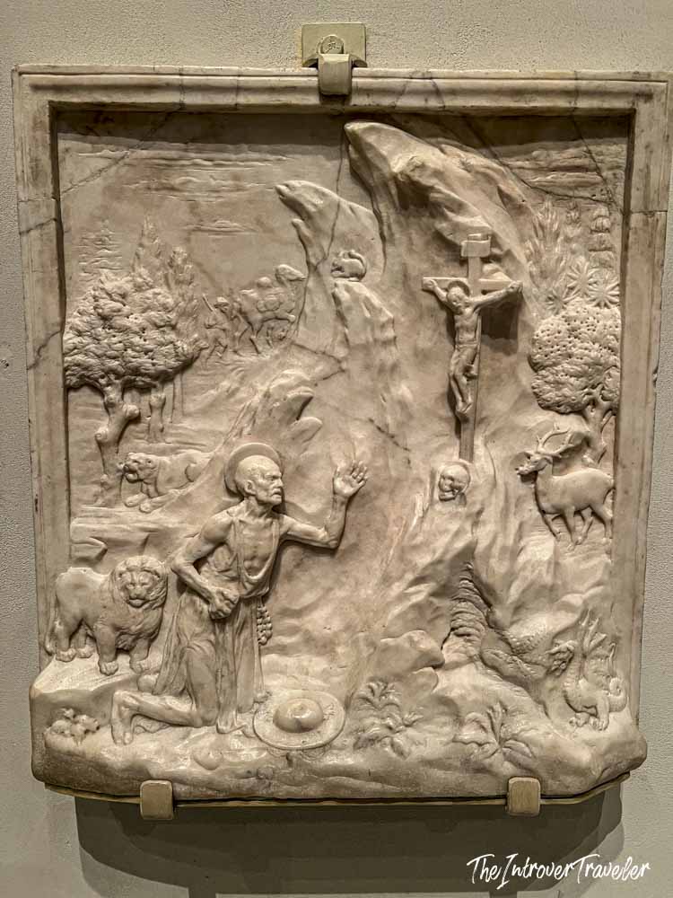 Marble relief of Saint Jerome in the wilderness with a lion, on display at the Met in New York