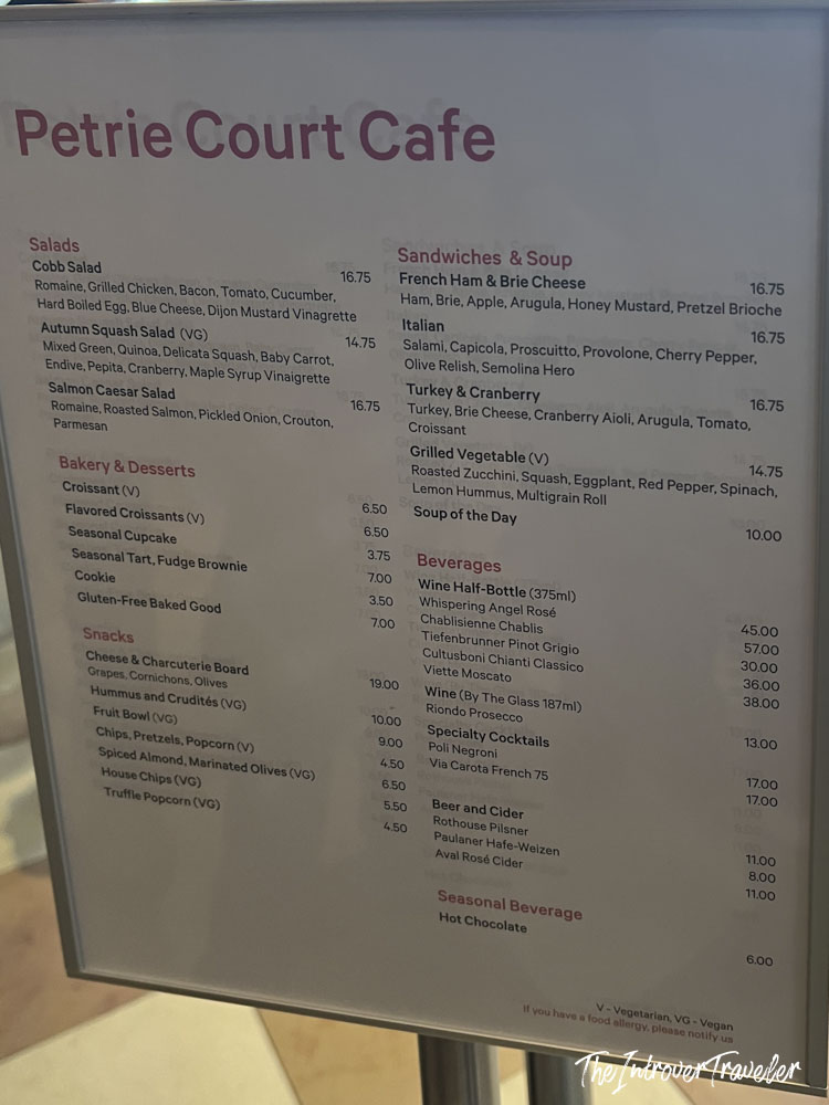 Petrie Court Cafe menu at the Met, showing salads, sandwiches, snacks, and beverages with prices