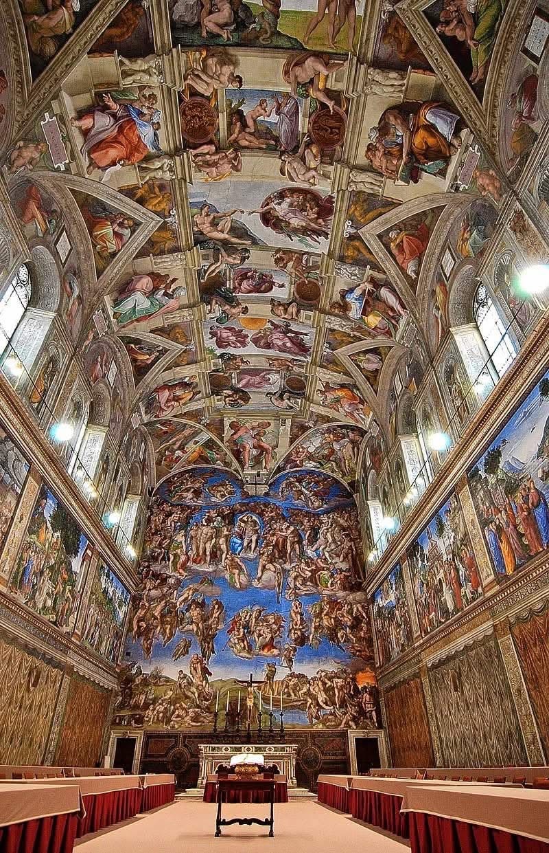 Sistine Chapel interior showing Michelangelo's ceiling frescoes and the Last Judgment altarpiece, Vatican City