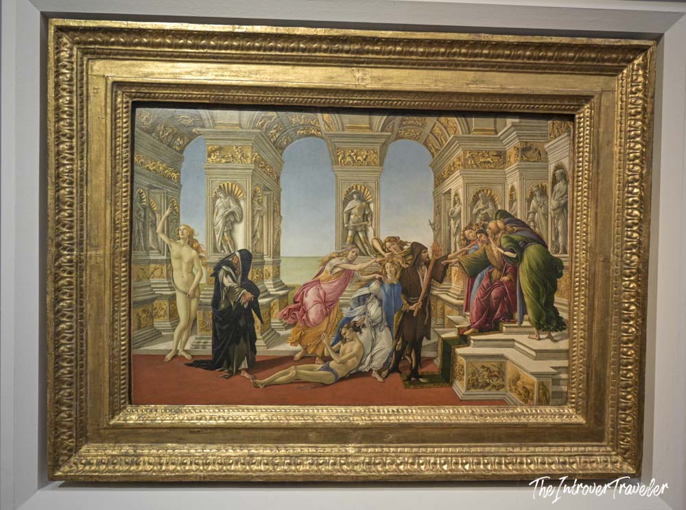 Calumny of Apelles by Botticelli, displayed in a gilded frame at the Uffizi Gallery Florence
