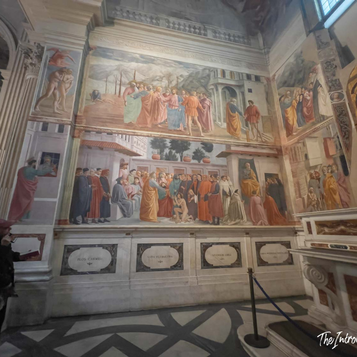 Masaccio frescoes covering the walls of the Brancacci Chapel in Florence, showing the Tribute Money and Saint Peter scenes