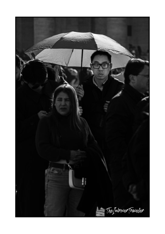 Crowds gathered in St. Peter's Square on a rainy day for the papal Angelus blessing