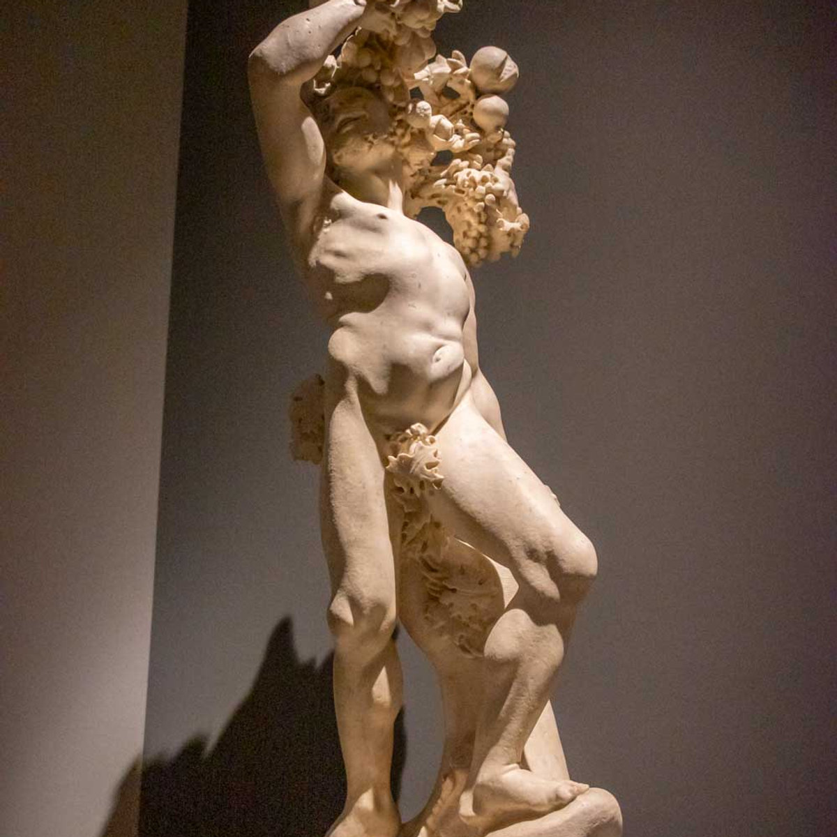 Baroque marble Bacchus sculpture by Bernini, displayed at the Palazzo Barberini exhibition on art and power