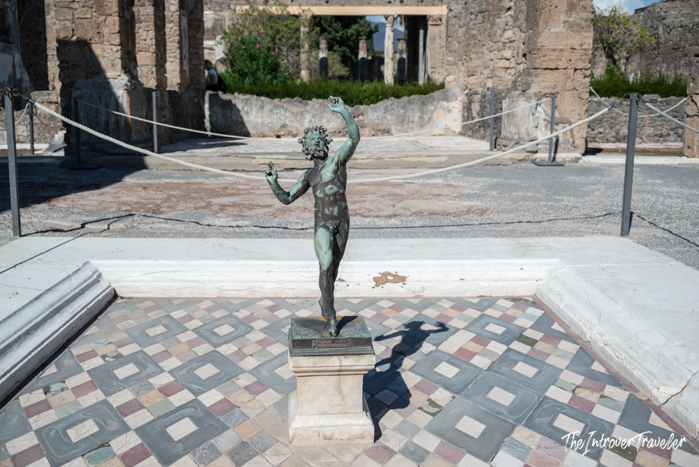 Bronze Dancing Faun replica in the atrium of the House of the Faun, Pompeii