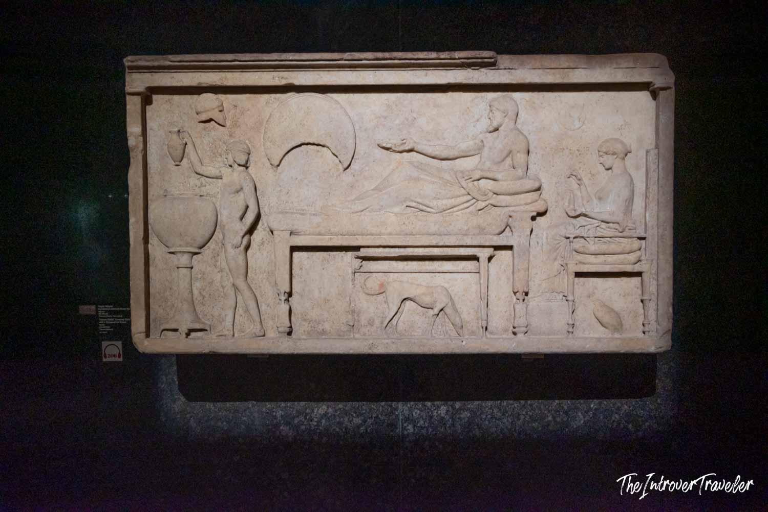 Ancient Greek funerary relief showing a reclining figure, servant, and dog, Istanbul Archaeological Museum