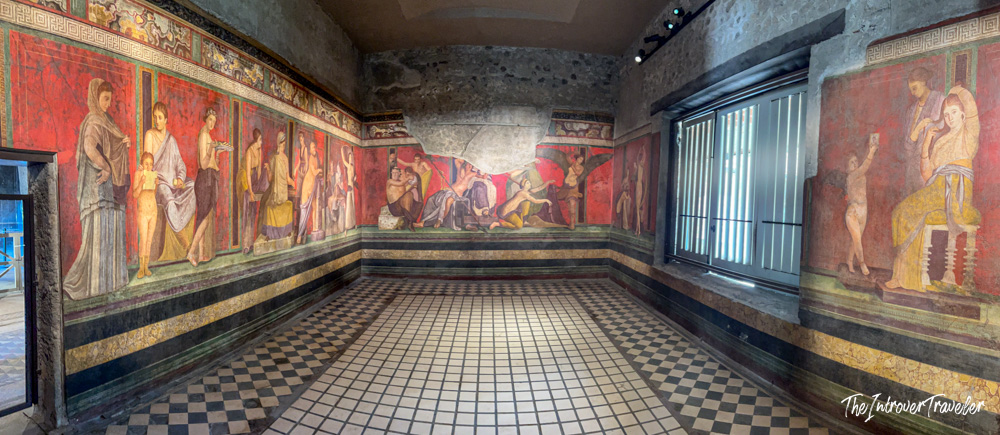 Dionysiac frieze frescoes covering the walls of the Villa of the Mysteries in Pompeii