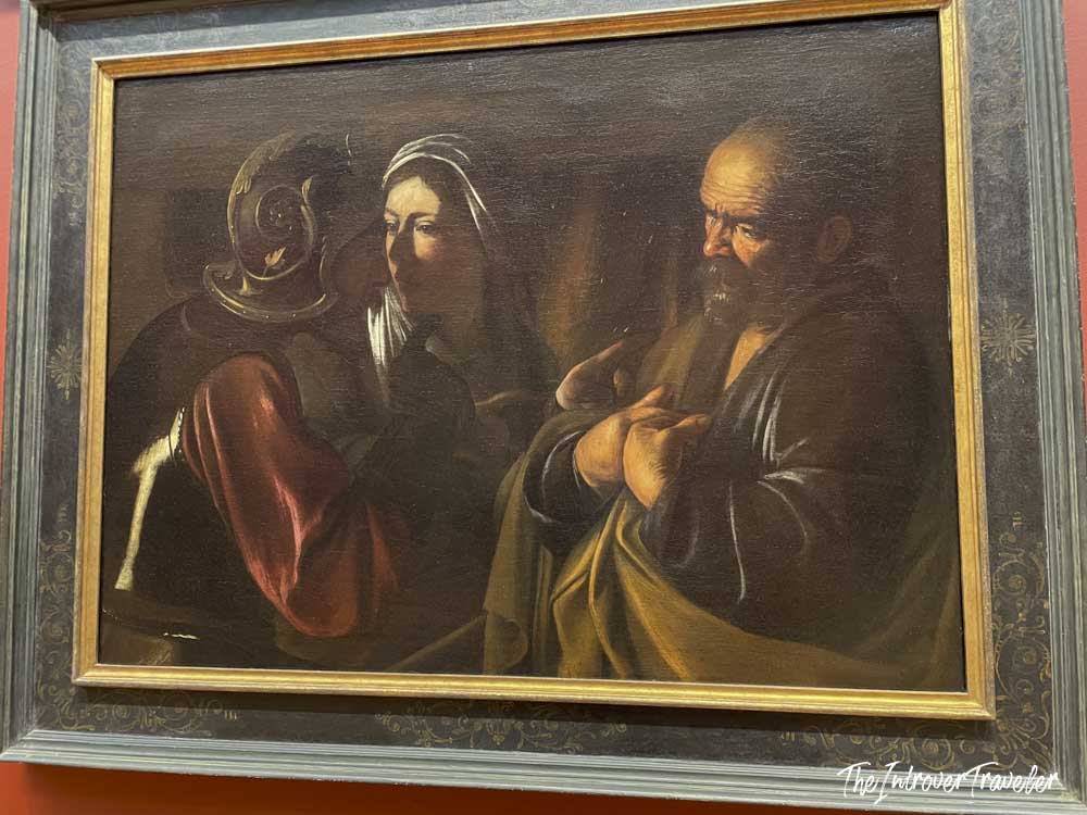 Baroque oil painting at the Metropolitan Museum showing the Denial of Saint Peter by Caravaggio