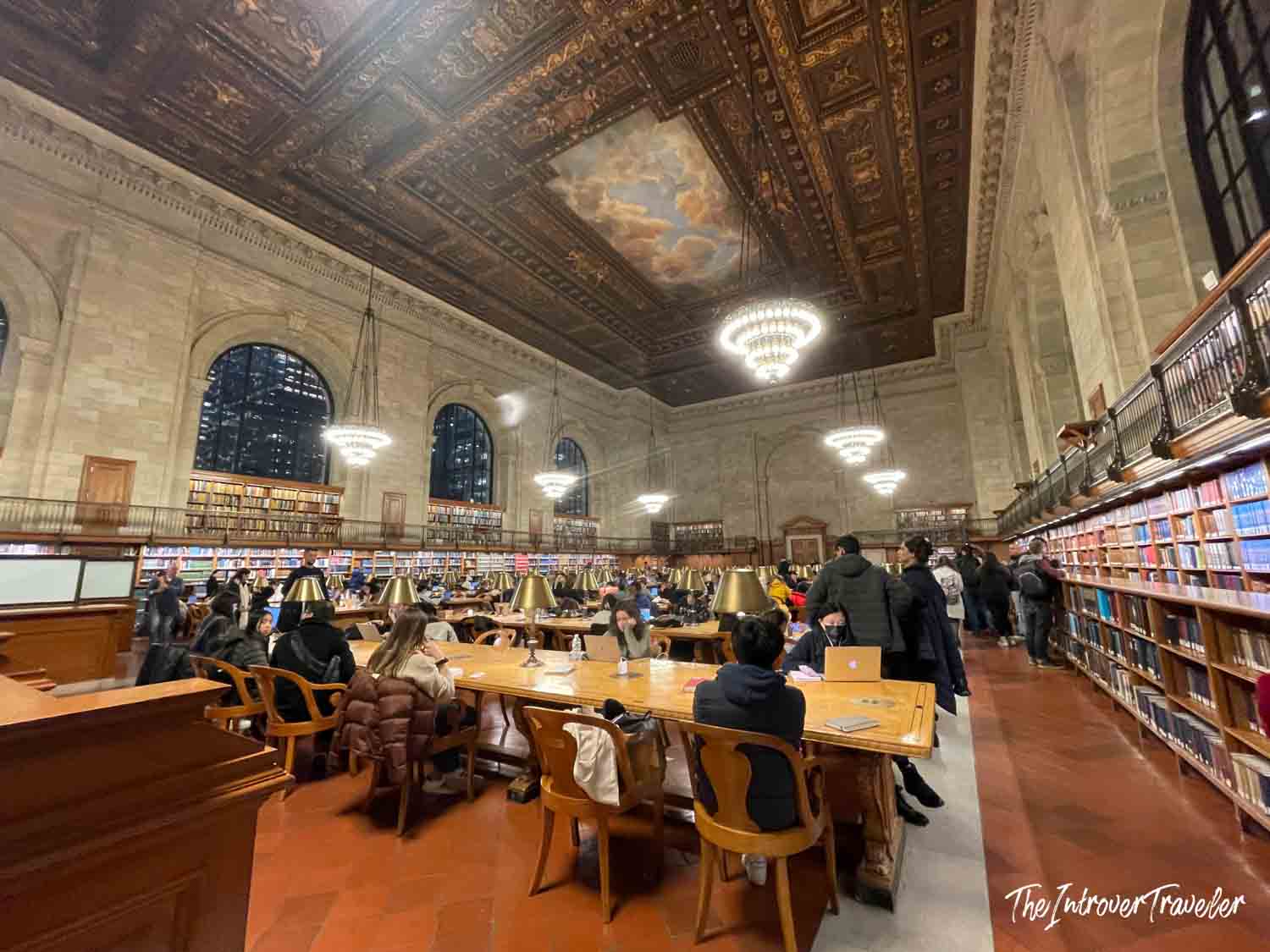 Rose Main Reading Room at the New York Public Library, with ornate painted ceiling and packed study tables