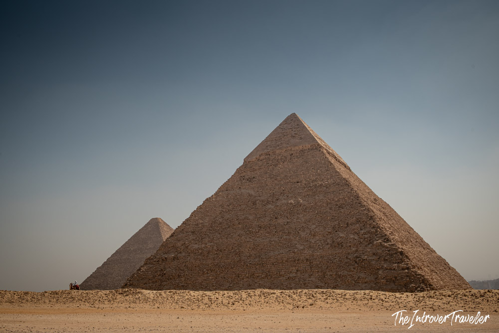Pyramid of Khafre towering over the Giza plateau, with the Pyramid of Menkaure behind it