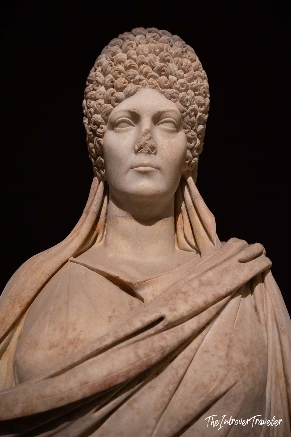 Ancient Roman marble bust of a noblewoman with elaborate curled hairstyle, Istanbul Archaeological Museum