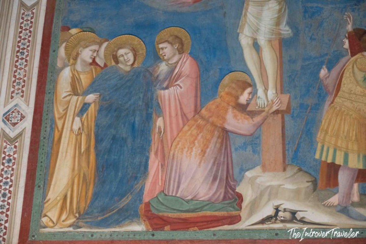 Giotto fresco detail in Scrovegni Chapel, Padua, showing haloed figures at the Crucifixion