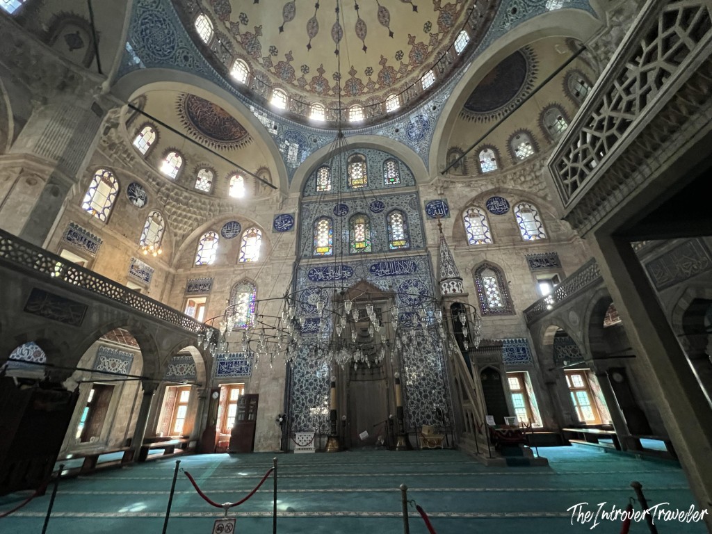 Interior of Sokollu Mehmet Pasha Mosque in Istanbul, with Iznik tile mihrab and domed ceiling
