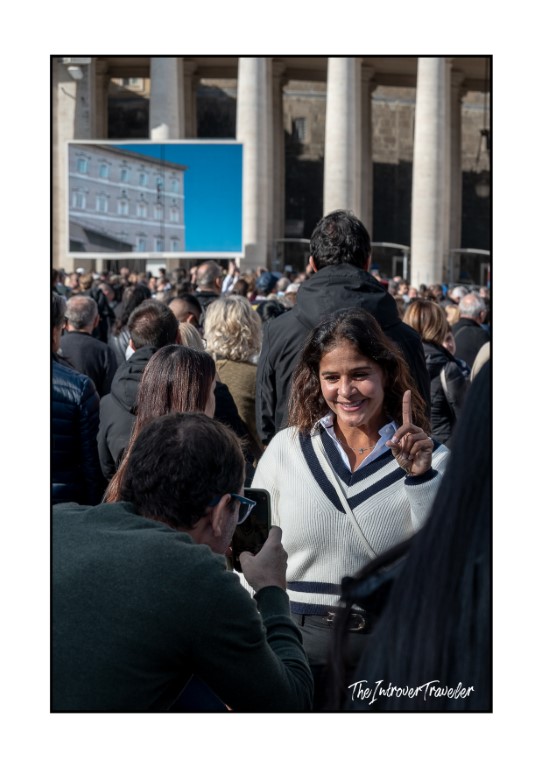 Smiling pilgrim photographed by a friend in the crowd at St. Peter's Square during the Angelus
