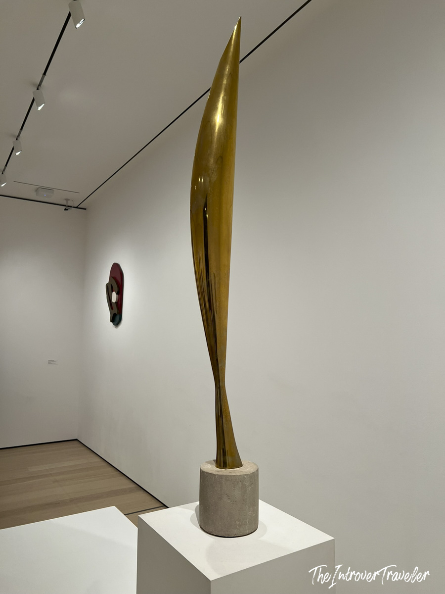 Brancusi's Bird in Space polished bronze sculpture on a stone base at MoMA New York