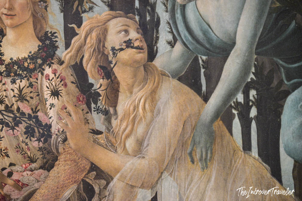 Close-up of Flora figure in Botticelli's Primavera, Uffizi Gallery Florence, showing paint damage detail