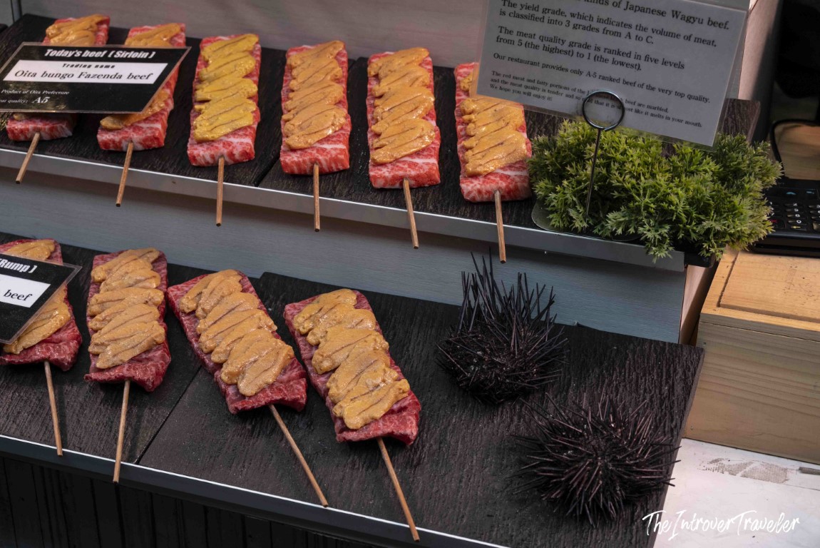 A5 Oita Bungo Fazenda Wagyu beef skewers topped with uni at Tsukiji outer market, Tokyo