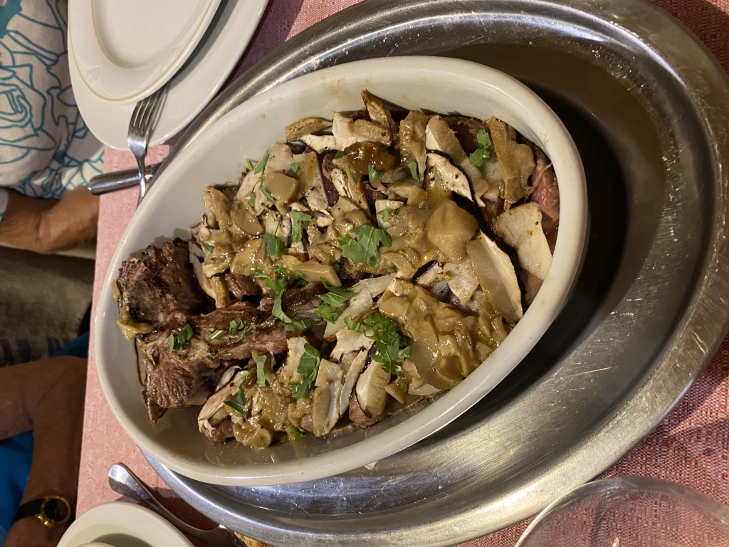 Braised beef with porcini mushrooms served at Taverna del Vecchio Borgo, Massa Marittima