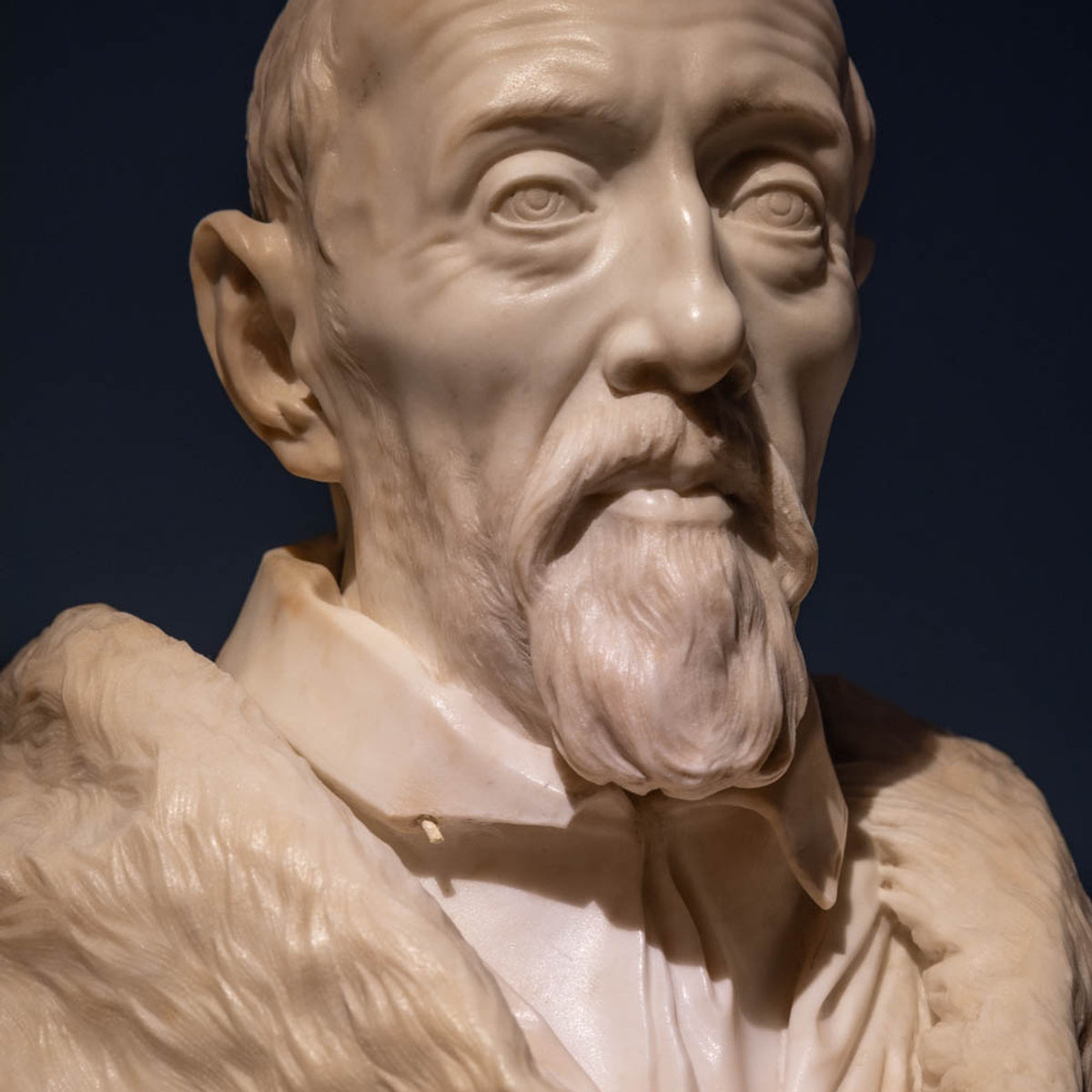 Close-up of Bernini's expressive marble bust portrait, on display at the Palazzo Barberini exhibition