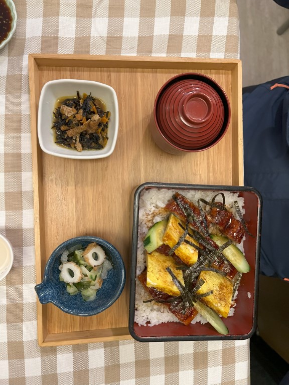 Unagi don set meal at Yuzuya, Japanese restaurant in Bologna, with pickles and miso soup