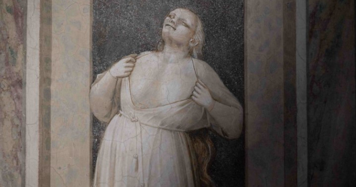 Giotto fresco detail of a grieving woman in the Scrovegni Chapel, Padua