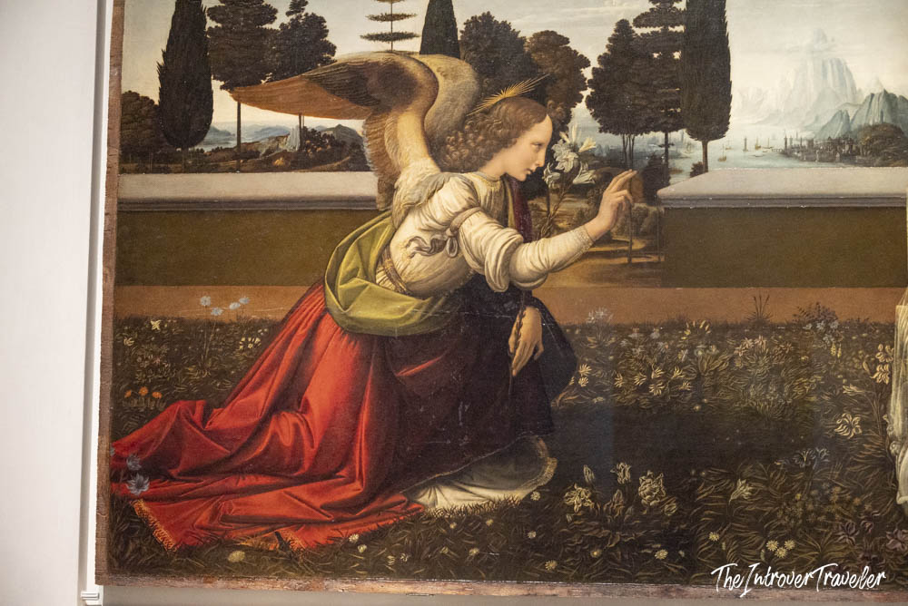 Angel Gabriel detail from Leonardo da Vinci's Annunciation painting at the Uffizi Gallery Florence
