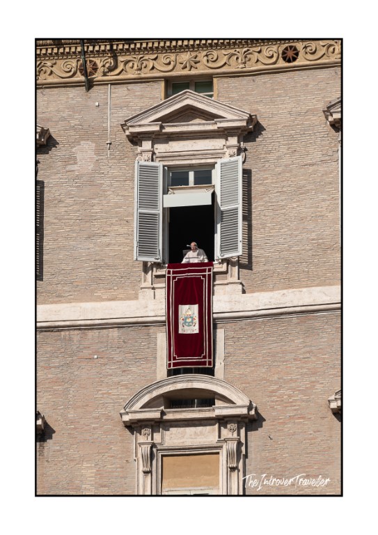 Pope Francis appearing at the Apostolic Palace window for the Sunday Angelus blessing in Vatican City