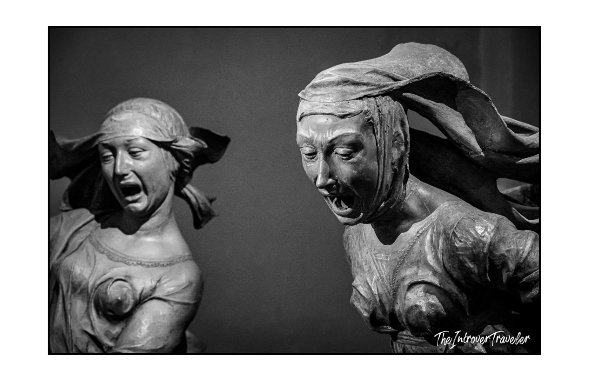Two anguished mourning figures from Niccolò dell'Arca's Lamentation over the Dead Christ, Bologna