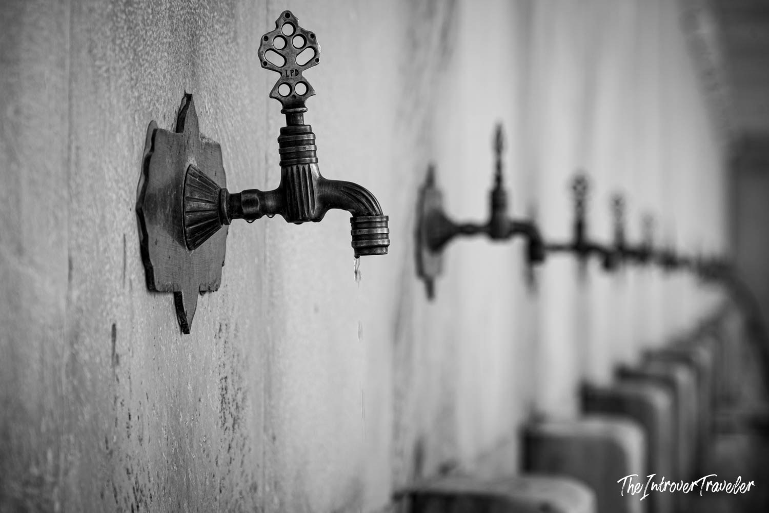 Ornate brass ablution taps for ritual washing at an Istanbul mosque
