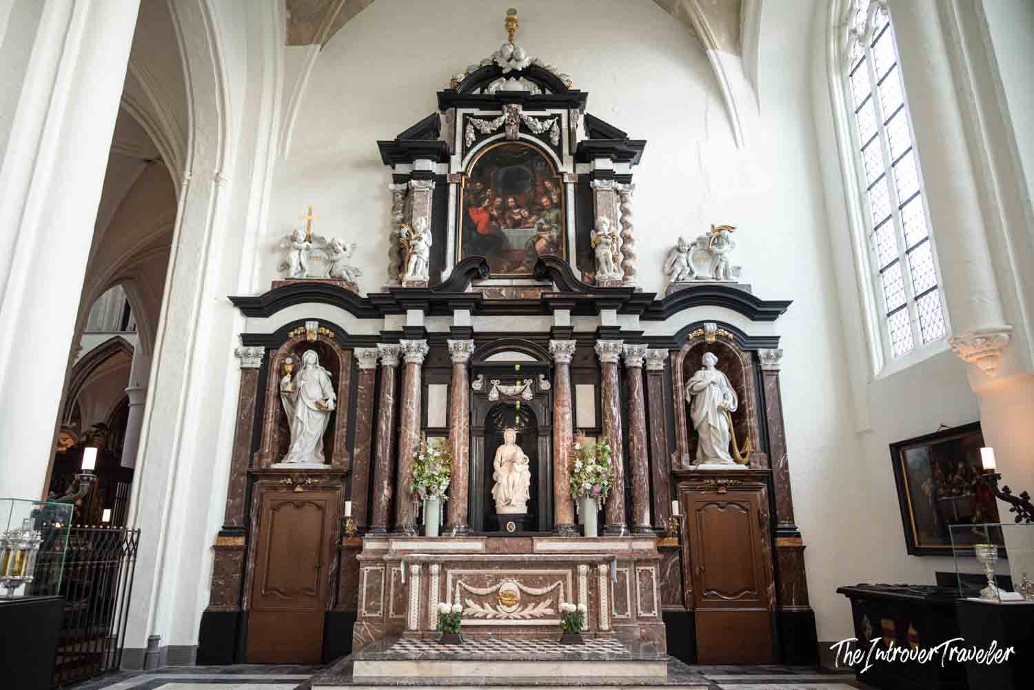 Michelangelo's Madonna of Bruges displayed in the baroque altar of the Church of Our Lady, Bruges