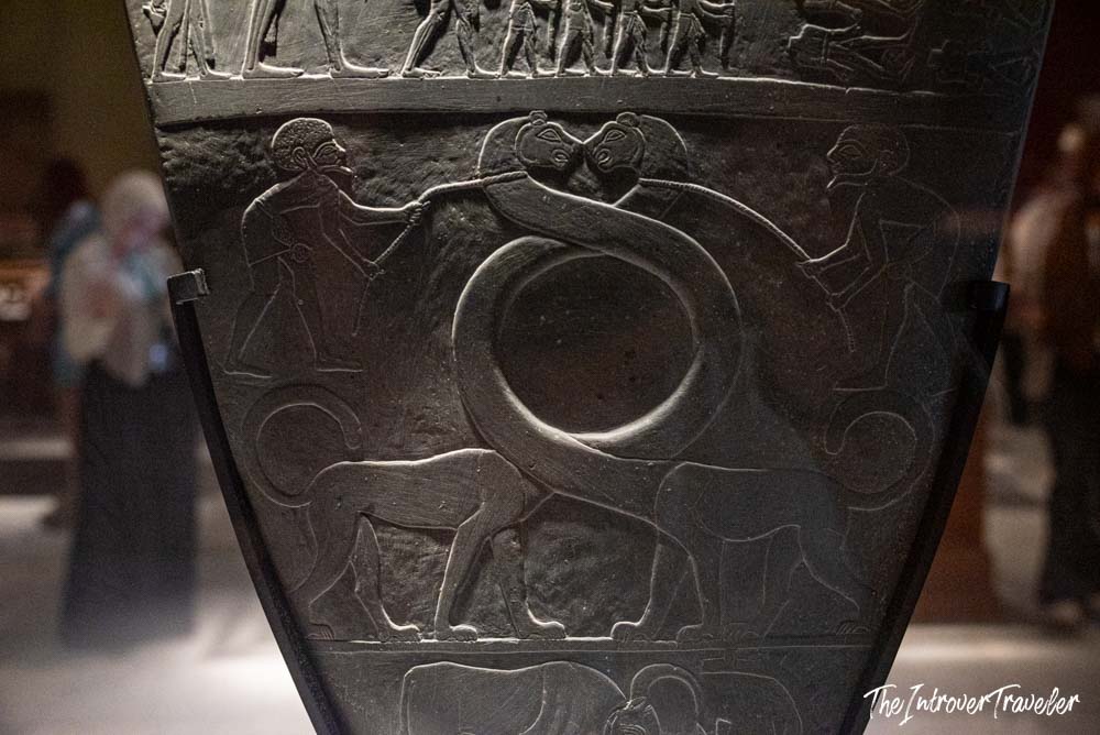 Close-up of the Narmer Palette relief carvings, a key artifact at the Egyptian Museum Cairo