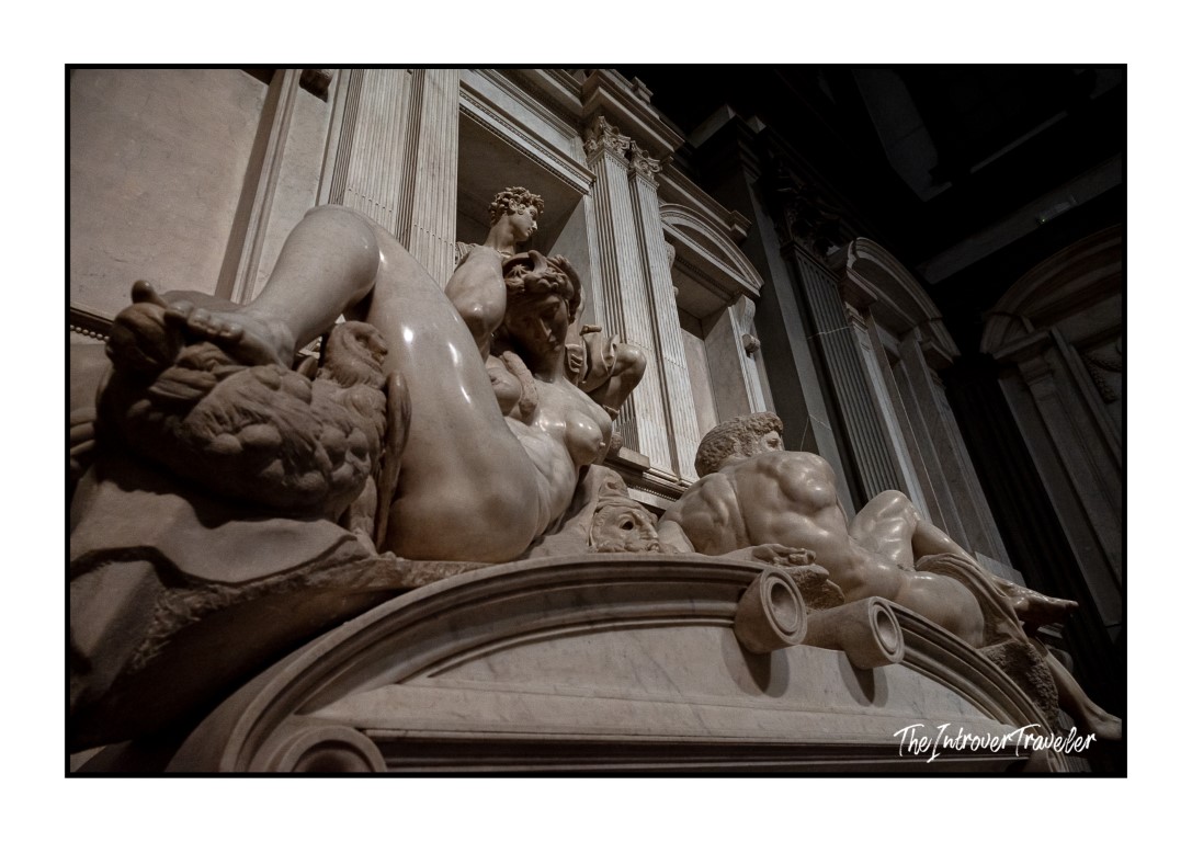 Michelangelo's Medici Tombs sculptures, Night, Day, and ducal figure, in Florence's New Sacristy