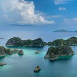Panoramic view of Raja Ampat limestone islands and turquoise lagoons, West Papua, Indonesia