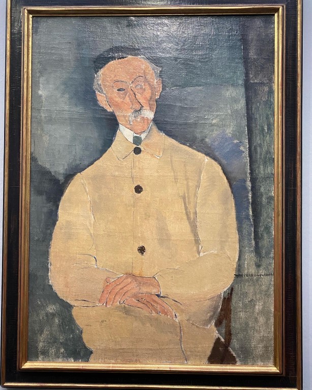 Modigliani portrait of an elderly man with folded hands, on display at the Albertina Museum Vienna