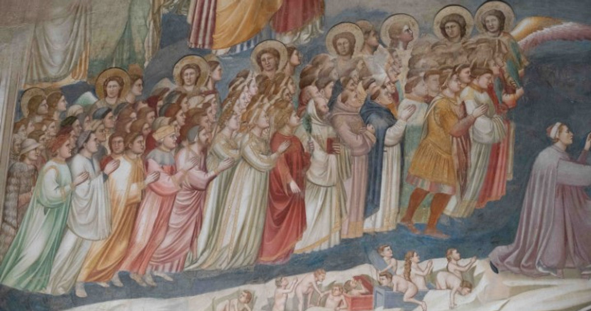 Detail of the Last Judgment fresco by Giotto in the Scrovegni Chapel, Padua, showing haloed saints and angels in prayer