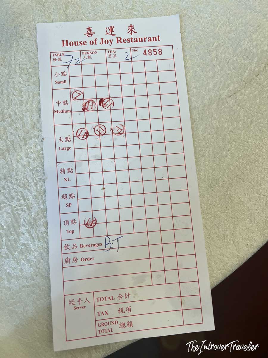 Dim sum order slip from House of Joy Restaurant, Chinatown Manhattan, with stamped items by category