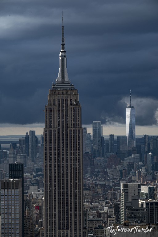 Empire State Building and One World Trade Center viewed from Top of the Rock under stormy skies
