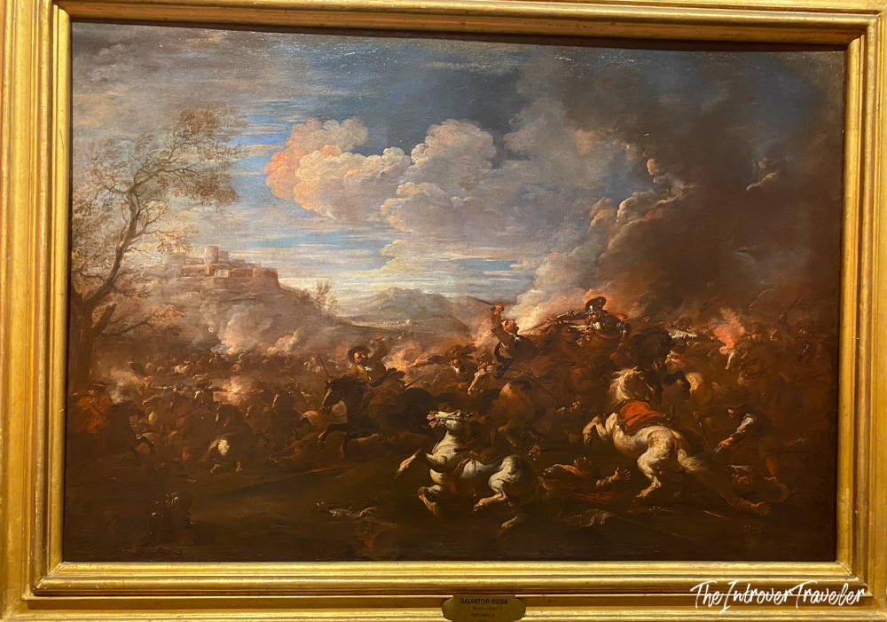 Battle scene painting by Salvator Rosa, displayed at a Lucca museum in Tuscany