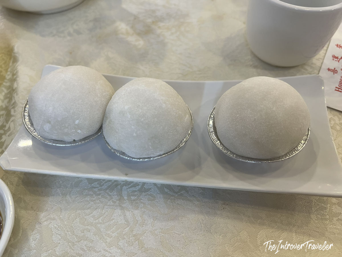 Three durian mochi balls in foil cups served at House of Joy, Chinatown Manhattan
