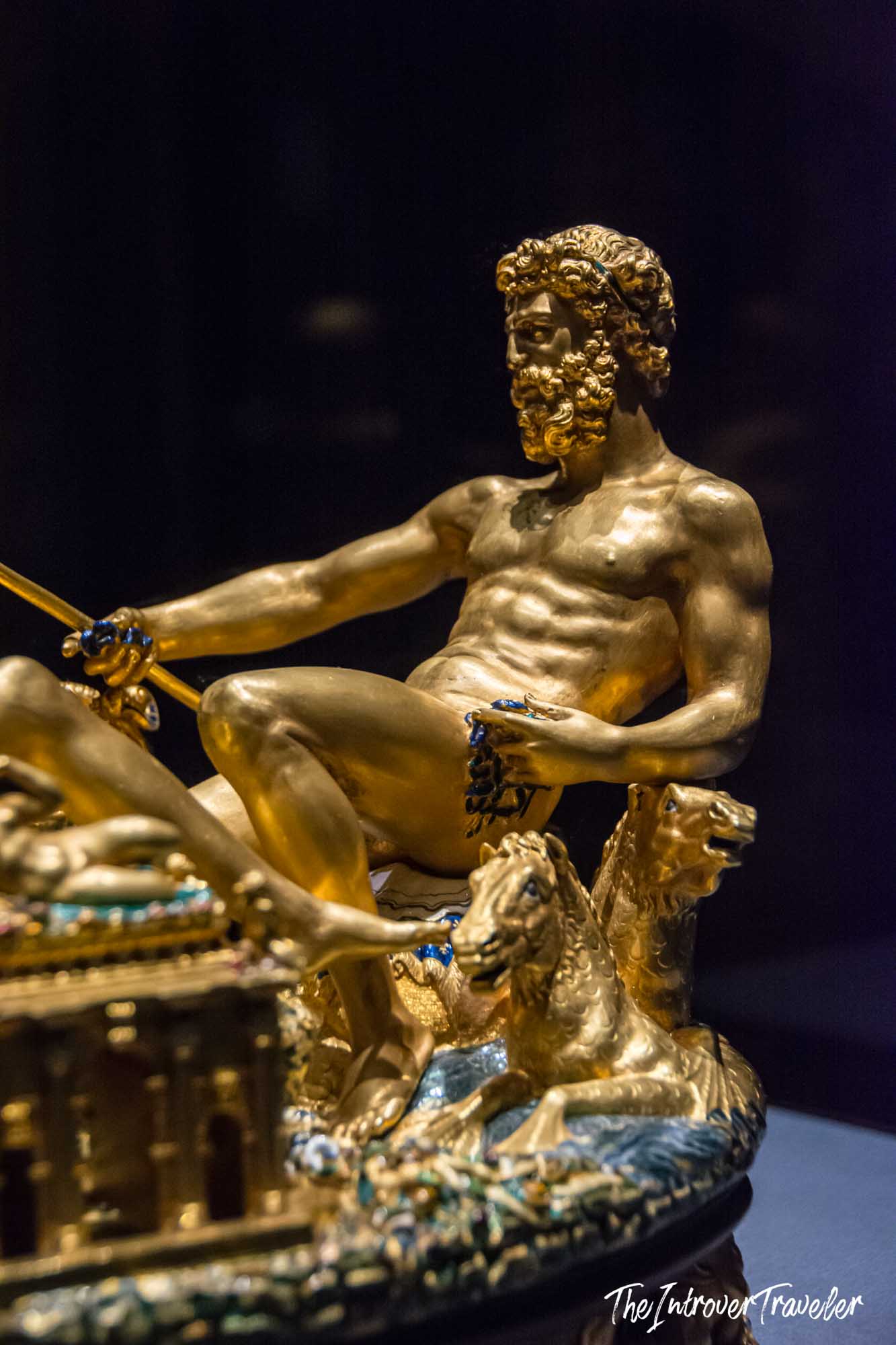 Gold Neptune figure on Cellini's Salt Cellar of Francis I, riding sea horses with enamel waves below