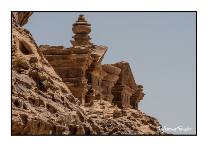 Close-up of Nabataean rock-cut facade carvings at Petra, Jordan, showing ornate sandstone details