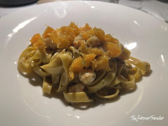 Tagliatelle with seafood and citrus topping, a fine dining pasta dish at L'Ebbrezza di Teonilla, Naples