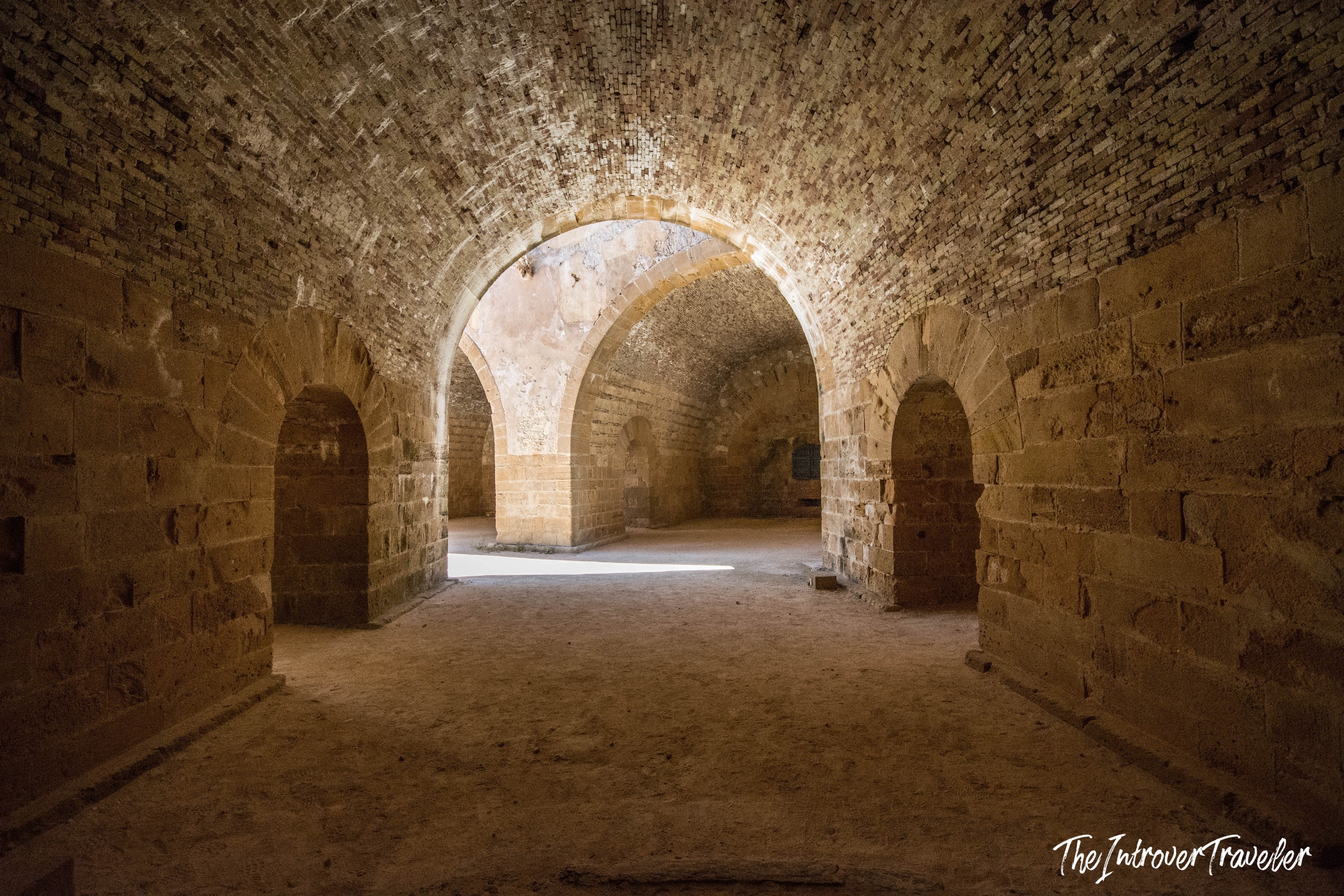 Interior vaulted stone halls of Castello Maniace, the Norman fortress on Ortigia island in Syracuse, Sicily
