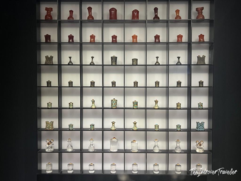 Backlit display case of Ottoman perfume bottles and vessels at Topkapi Palace, Istanbul