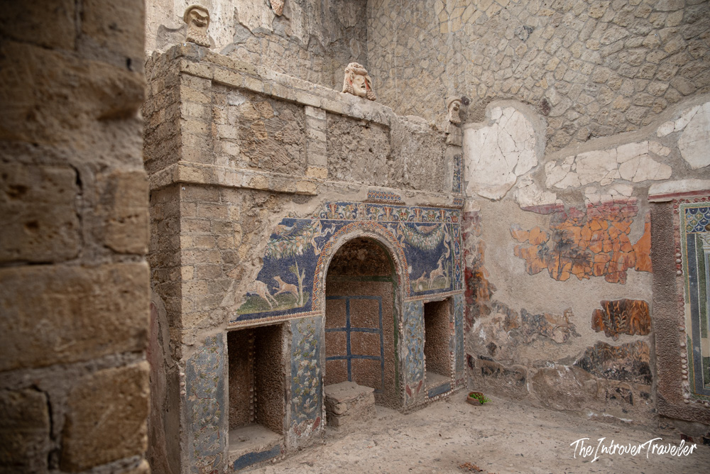 Mosaic-decorated nymphaeum niche with animal hunt scenes inside a Herculaneum house