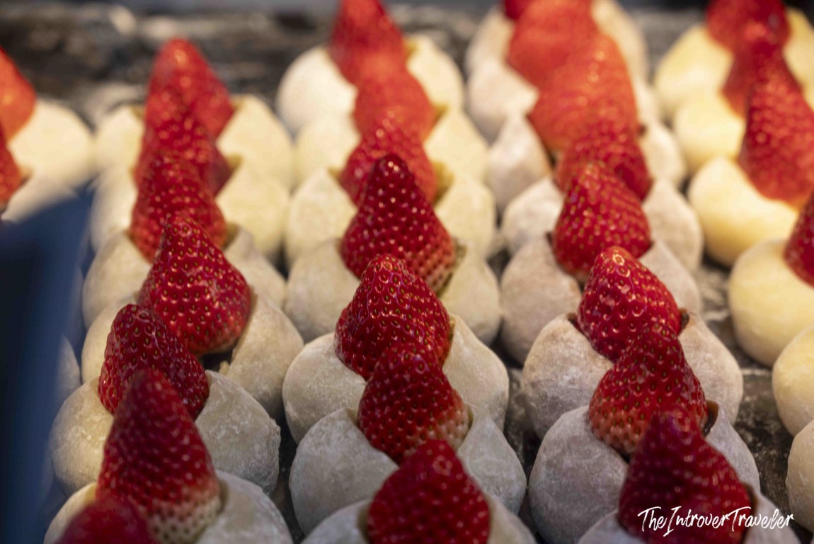 Rows of fresh strawberry mochi desserts on display at Tsukiji outer market, Tokyo