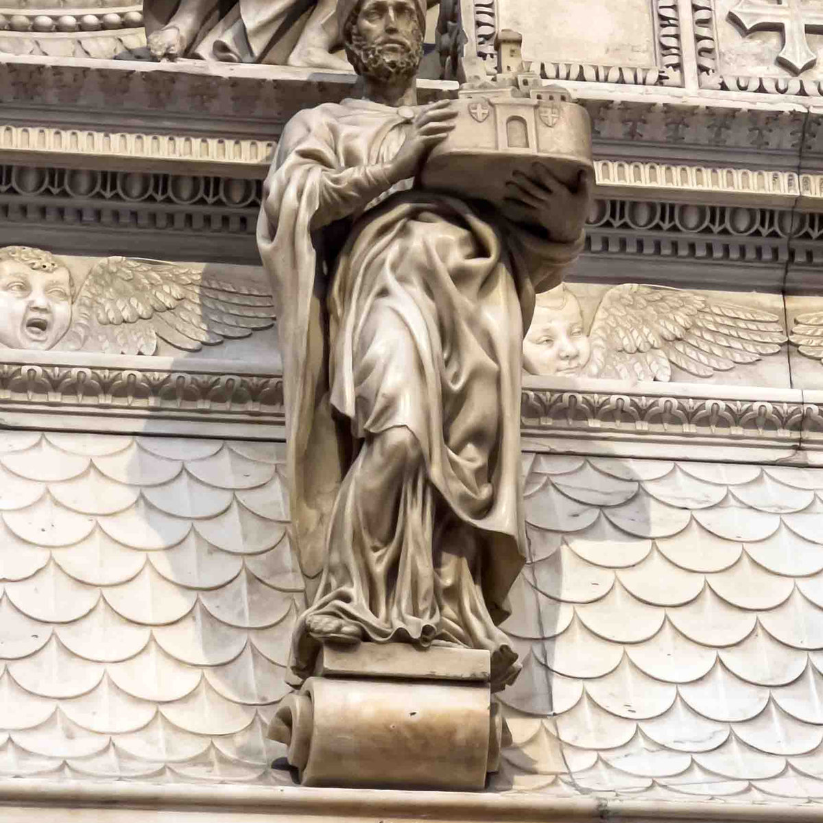 Marble statue of Saint Petronius holding a model of Bologna on the Ark of San Domenico